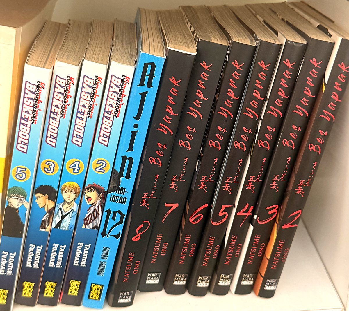 Turkish editions of Kuroko’s Basketball, Ajin and Five Leaves on a bookshelf